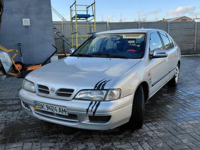 Серый Ниссан Примера, объемом двигателя 2 л и пробегом 356 тыс. км за 1250 $, фото 1 на Automoto.ua