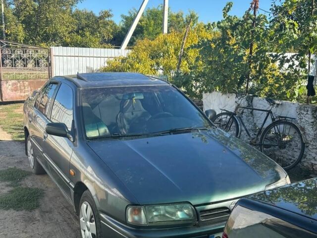 Сірий Ніссан Прімера, об'ємом двигуна 2 л та пробігом 222 тис. км за 1500 $, фото 1 на Automoto.ua
