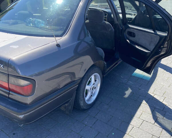 Сірий Ніссан Прімера, об'ємом двигуна 2 л та пробігом 354 тис. км за 1400 $, фото 1 на Automoto.ua