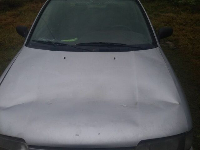 Серый Ниссан Примера, объемом двигателя 1.6 л и пробегом 200 тыс. км за 1000 $, фото 1 на Automoto.ua