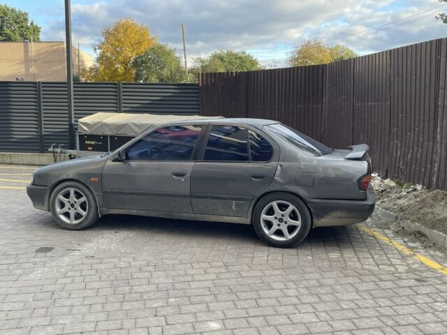 Серый Ниссан Примера, объемом двигателя 2 л и пробегом 400 тыс. км за 1500 $, фото 1 на Automoto.ua