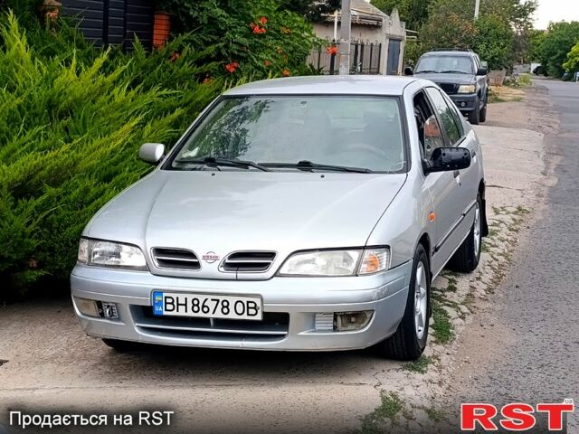 Серый Ниссан Примера, объемом двигателя 2 л и пробегом 222 тыс. км за 2450 $, фото 1 на Automoto.ua