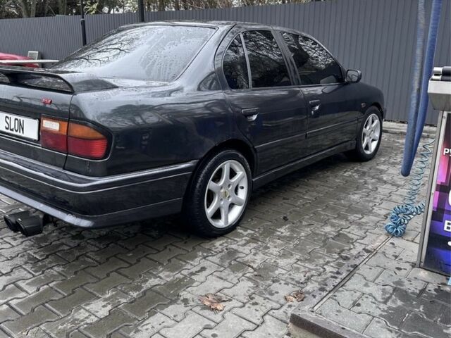 Сірий Ніссан Прімера, об'ємом двигуна 2 л та пробігом 240 тис. км за 2400 $, фото 1 на Automoto.ua