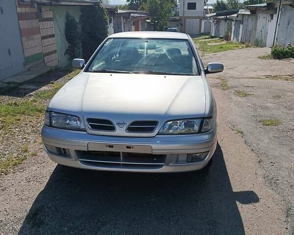 Серый Ниссан Примера, объемом двигателя 1.6 л и пробегом 213 тыс. км за 2600 $, фото 1 на Automoto.ua