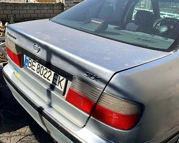 Сірий Ніссан Прімера, об'ємом двигуна 2 л та пробігом 300 тис. км за 2000 $, фото 1 на Automoto.ua