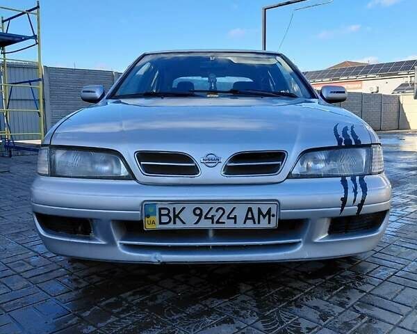 Сірий Ніссан Прімера, об'ємом двигуна 2 л та пробігом 354 тис. км за 2300 $, фото 1 на Automoto.ua
