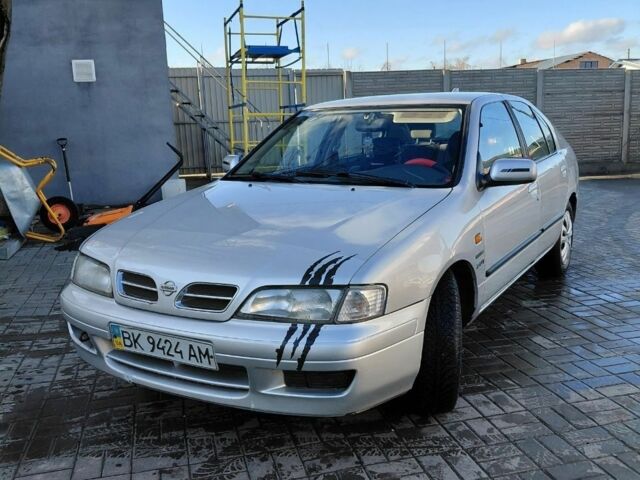 Сірий Ніссан Прімера, об'ємом двигуна 2 л та пробігом 354 тис. км за 2300 $, фото 1 на Automoto.ua