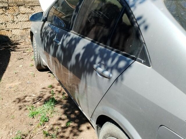 Серый Ниссан Примера, объемом двигателя 1.8 л и пробегом 250 тыс. км за 1065 $, фото 1 на Automoto.ua