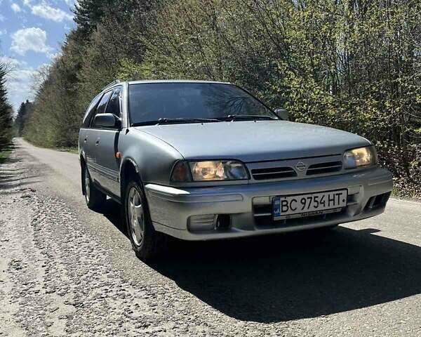 Сірий Ніссан Прімера, об'ємом двигуна 2 л та пробігом 337 тис. км за 2100 $, фото 1 на Automoto.ua