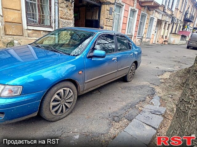 Синий Ниссан Примера, объемом двигателя 2 л и пробегом 12 тыс. км за 2200 $, фото 1 на Automoto.ua