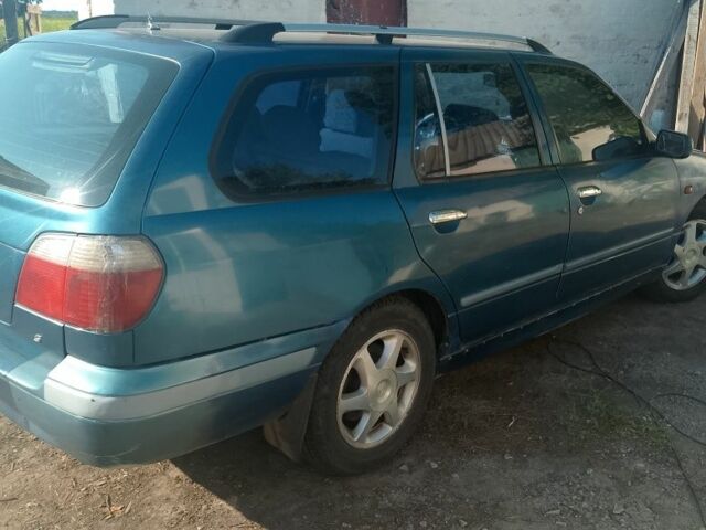 Синий Ниссан Примера, объемом двигателя 1.6 л и пробегом 390 тыс. км за 1000 $, фото 1 на Automoto.ua