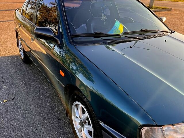 Зелений Ніссан Прімера, об'ємом двигуна 1.6 л та пробігом 405 тис. км за 2000 $, фото 1 на Automoto.ua