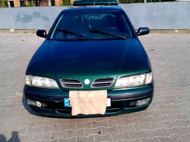 Зеленый Ниссан Примера, объемом двигателя 1.6 л и пробегом 45 тыс. км за 1000 $, фото 1 на Automoto.ua