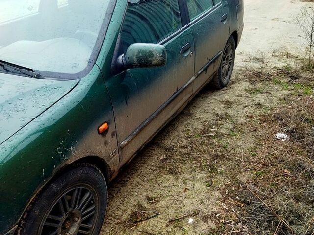 Зеленый Ниссан Примера, объемом двигателя 2 л и пробегом 200 тыс. км за 1850 $, фото 1 на Automoto.ua