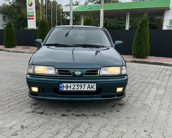 Зеленый Ниссан Примера, объемом двигателя 2 л и пробегом 236 тыс. км за 3700 $, фото 1 на Automoto.ua