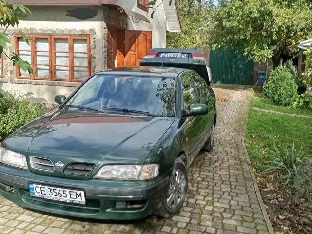 Зелений Ніссан Прімера, об'ємом двигуна 2 л та пробігом 400 тис. км за 1900 $, фото 1 на Automoto.ua