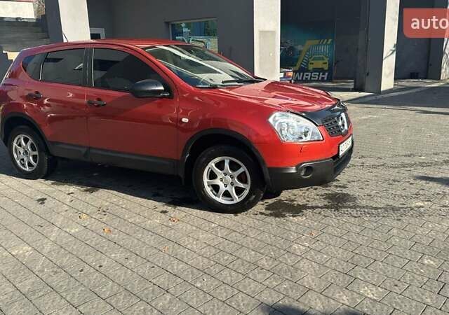 Красный Ниссан Кашкай, объемом двигателя 2 л и пробегом 136 тыс. км за 7850 $, фото 1 на Automoto.ua