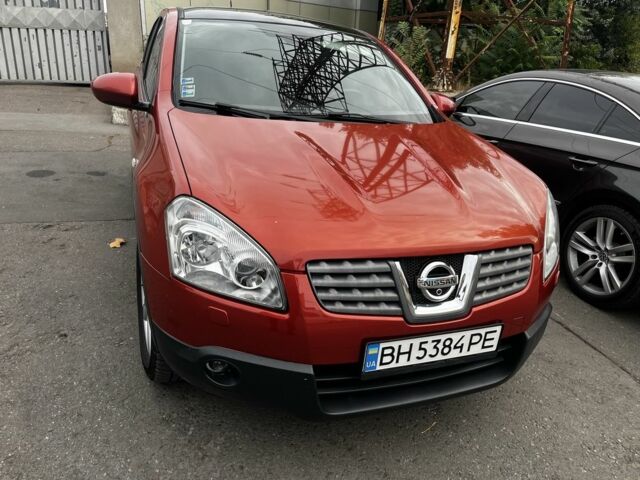 Червоний Ніссан Кашкай, об'ємом двигуна 2 л та пробігом 235 тис. км за 9500 $, фото 1 на Automoto.ua