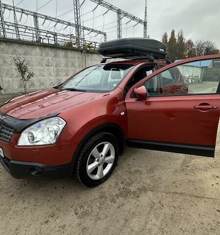 Красный Ниссан Кашкай, объемом двигателя 2 л и пробегом 104 тыс. км за 9000 $, фото 1 на Automoto.ua