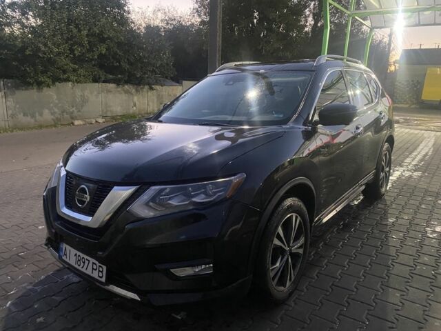 Черный Ниссан Rogue, объемом двигателя 2.5 л и пробегом 144 тыс. км за 17000 $, фото 1 на Automoto.ua