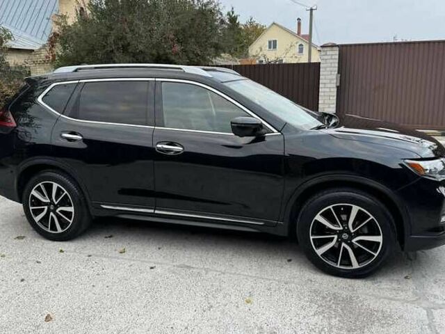 Черный Ниссан Rogue, объемом двигателя 2.5 л и пробегом 100 тыс. км за 12000 $, фото 1 на Automoto.ua