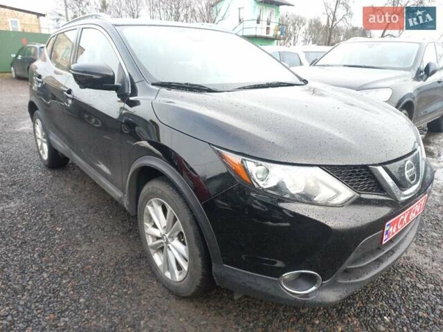 Черный Ниссан Rogue, объемом двигателя 2 л и пробегом 150 тыс. км за 12500 $, фото 1 на Automoto.ua
