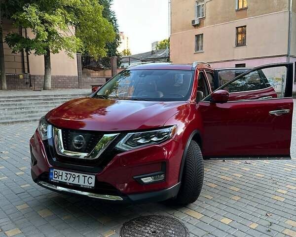 Красный Ниссан Rogue, объемом двигателя 2.49 л и пробегом 135 тыс. км за 16999 $, фото 1 на Automoto.ua