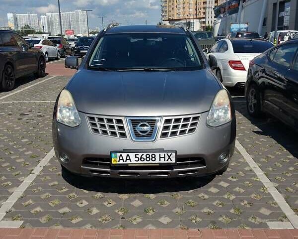 Серый Ниссан Rogue, объемом двигателя 2.5 л и пробегом 180 тыс. км за 6000 $, фото 1 на Automoto.ua