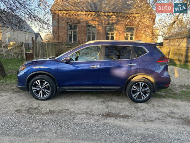 Синий Ниссан Rogue, объемом двигателя 2.49 л и пробегом 98 тыс. км за 17000 $, фото 1 на Automoto.ua