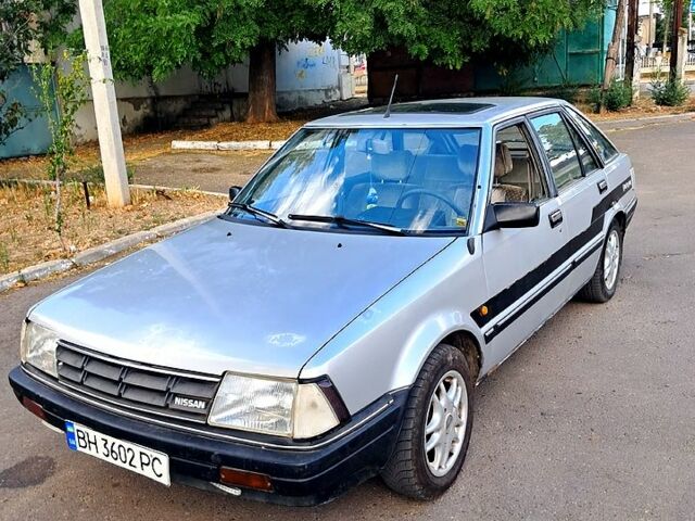 Серый Ниссан Станза, объемом двигателя 1.8 л и пробегом 315 тыс. км за 1000 $, фото 1 на Automoto.ua