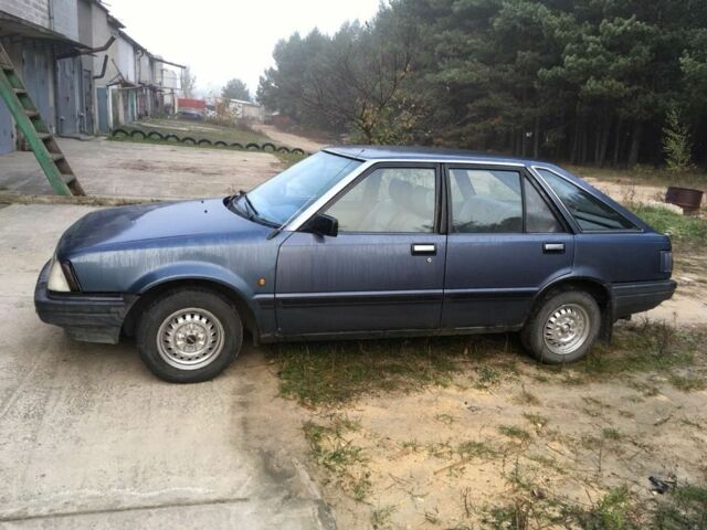 Синий Ниссан Станза, объемом двигателя 1.8 л и пробегом 214 тыс. км за 500 $, фото 1 на Automoto.ua