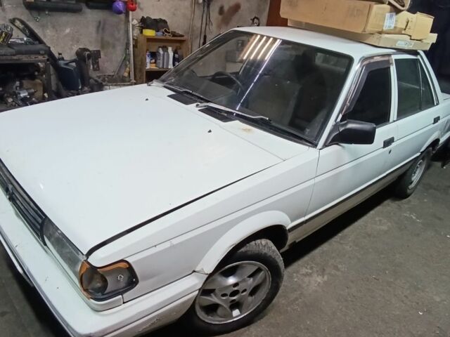 Белый Ниссан Санни, объемом двигателя 1.3 л и пробегом 240 тыс. км за 475 $, фото 1 на Automoto.ua