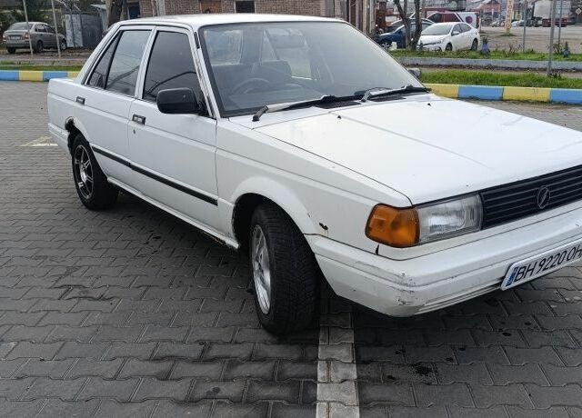 Белый Ниссан Санни, объемом двигателя 1.3 л и пробегом 260 тыс. км за 550 $, фото 1 на Automoto.ua