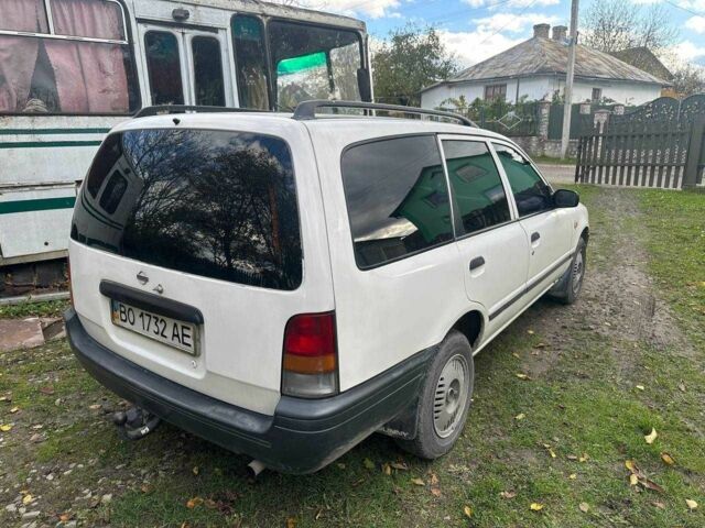 Білий Ніссан Санні, об'ємом двигуна 2 л та пробігом 245 тис. км за 1099 $, фото 1 на Automoto.ua