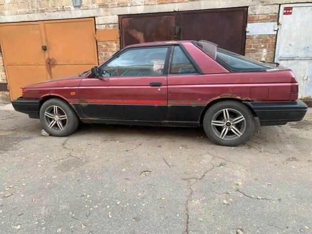 Красный Ниссан Санни, объемом двигателя 1.6 л и пробегом 210 тыс. км за 400 $, фото 1 на Automoto.ua