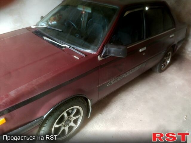 Червоний Ніссан Санні, об'ємом двигуна 1.5 л та пробігом 190 тис. км за 400 $, фото 1 на Automoto.ua