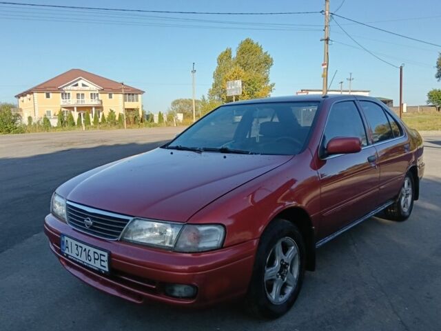 Червоний Ніссан Санні, об'ємом двигуна 1.6 л та пробігом 345 тис. км за 1650 $, фото 1 на Automoto.ua