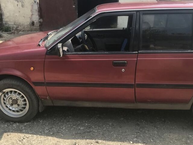 Красный Ниссан Санни, объемом двигателя 1.7 л и пробегом 250 тыс. км за 840 $, фото 1 на Automoto.ua