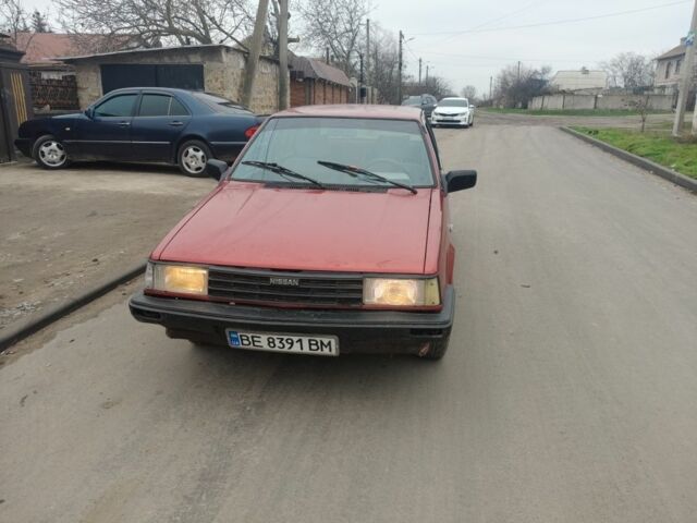 Красный Ниссан Санни, объемом двигателя 1.5 л и пробегом 2 тыс. км за 700 $, фото 1 на Automoto.ua