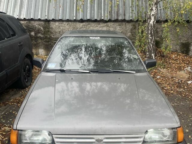 Серый Ниссан Санни, объемом двигателя 1.8 л и пробегом 244 тыс. км за 1500 $, фото 1 на Automoto.ua