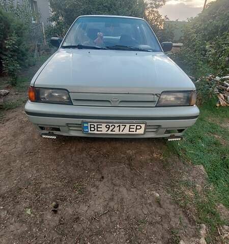 Серый Ниссан Санни, объемом двигателя 1.4 л и пробегом 300 тыс. км за 1454 $, фото 1 на Automoto.ua