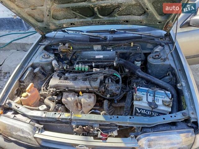 Серый Ниссан Санни, объемом двигателя 1.39 л и пробегом 300 тыс. км за 1700 $, фото 1 на Automoto.ua