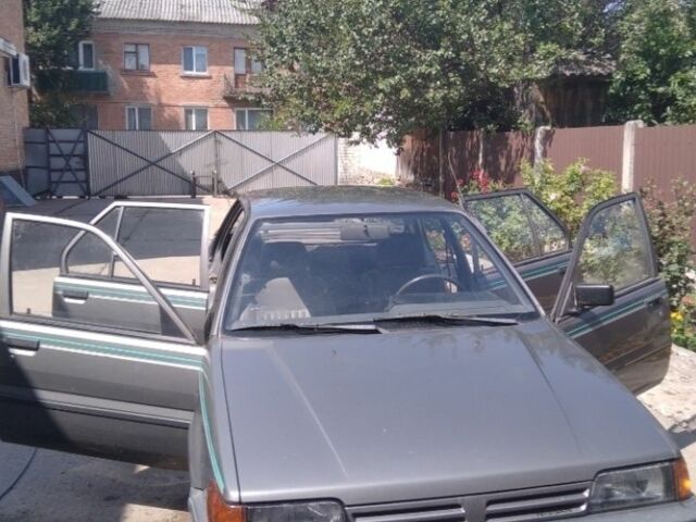 Серый Ниссан Санни, объемом двигателя 0 л и пробегом 600 тыс. км за 604 $, фото 1 на Automoto.ua