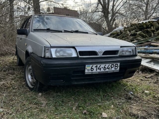 Серый Ниссан Санни, объемом двигателя 1.7 л и пробегом 370 тыс. км за 330 $, фото 1 на Automoto.ua