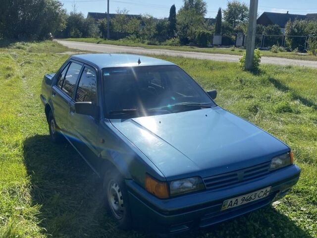 Синій Ніссан Санні, об'ємом двигуна 1.4 л та пробігом 250 тис. км за 673 $, фото 1 на Automoto.ua