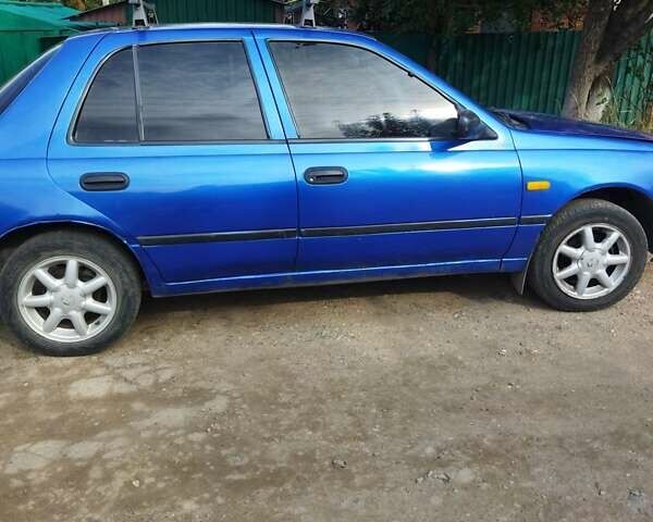 Синий Ниссан Санни, объемом двигателя 1.6 л и пробегом 447 тыс. км за 1700 $, фото 1 на Automoto.ua