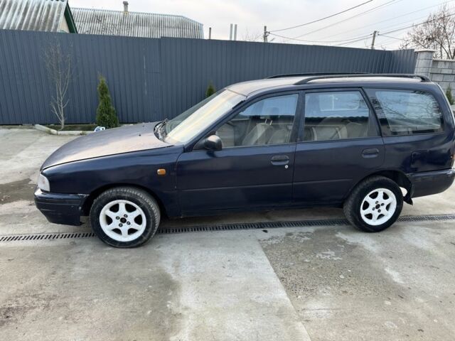 Синий Ниссан Санни, объемом двигателя 1.4 л и пробегом 250 тыс. км за 700 $, фото 1 на Automoto.ua