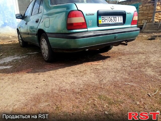 Зеленый Ниссан Санни, объемом двигателя 1.4 л и пробегом 200 тыс. км за 1150 $, фото 1 на Automoto.ua