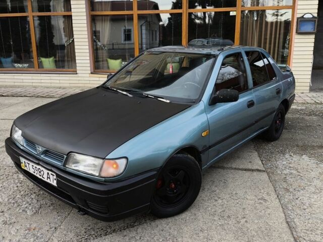 Зелений Ніссан Санні, об'ємом двигуна 1.4 л та пробігом 444 тис. км за 1649 $, фото 1 на Automoto.ua