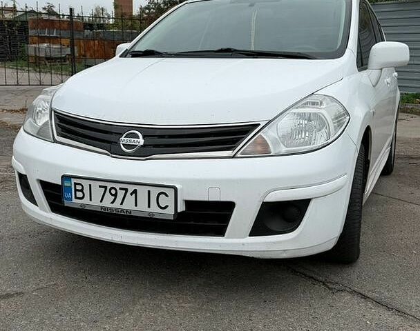 Білий Ніссан Тііда, об'ємом двигуна 1.6 л та пробігом 160 тис. км за 7500 $, фото 1 на Automoto.ua
